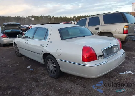 2007 Lincoln Town Car Signature Limited из США, поврежденный, VIN 1LNHM82W07Y614464